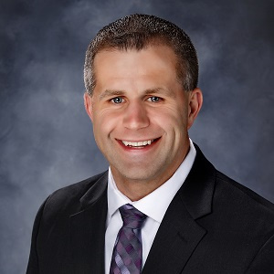 Marc Mayer of Commerical Lending in a suit and tie