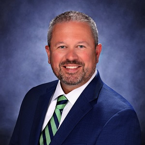 Commerical Lending Officer Brandon West in a suit and tie