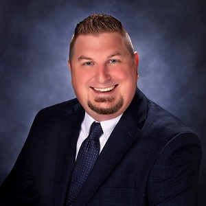 Blake in a suit and tie